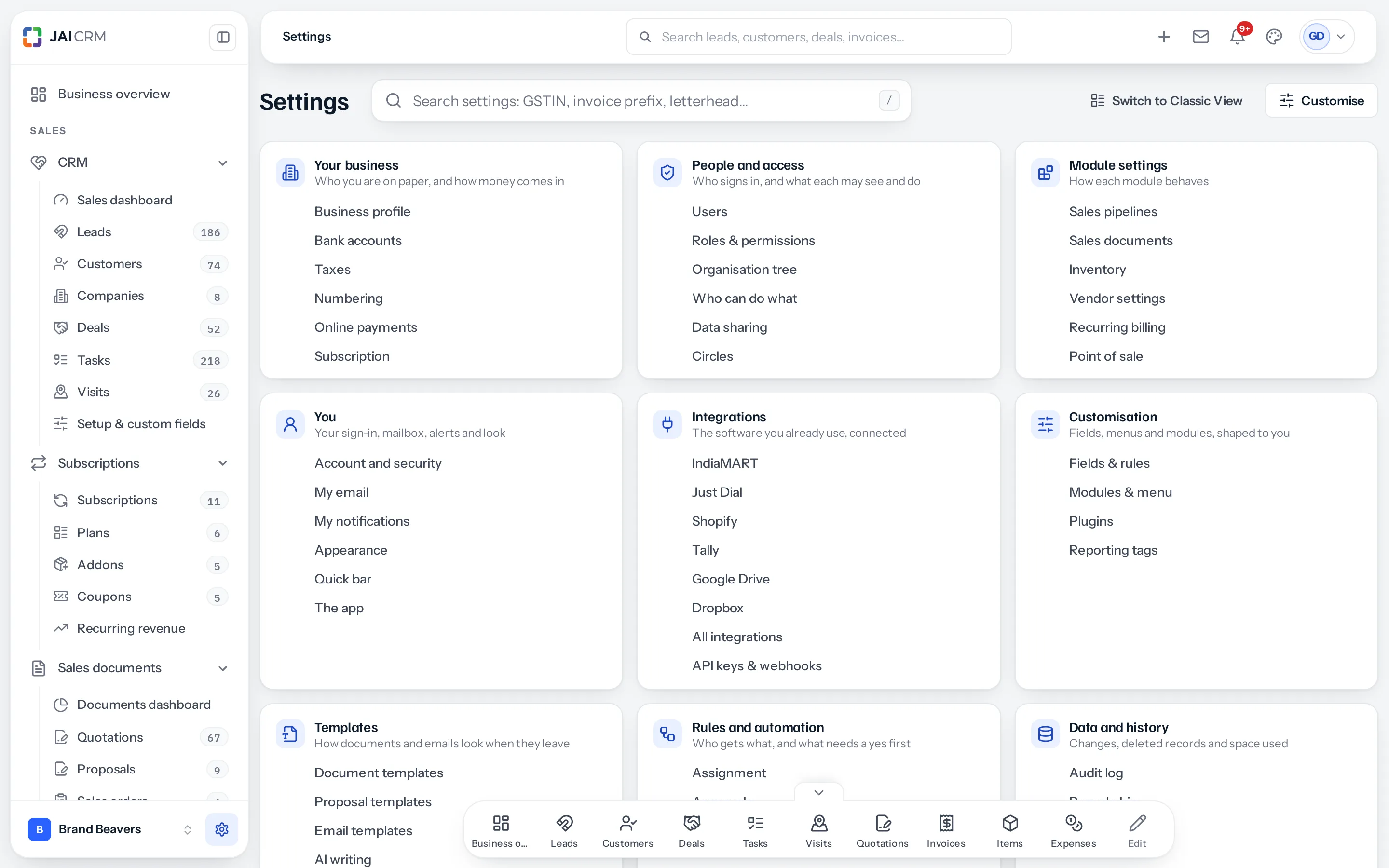 The Settings page: a search box reading Search settings: GSTIN, invoice prefix, letterhead, the buttons Switch to Classic View and Customise, and nine group cards three to a row: Your business, People and access, Module settings, You, Integrations, Customisation, Templates, Rules and automation, and Data and history, each listing its settings.
