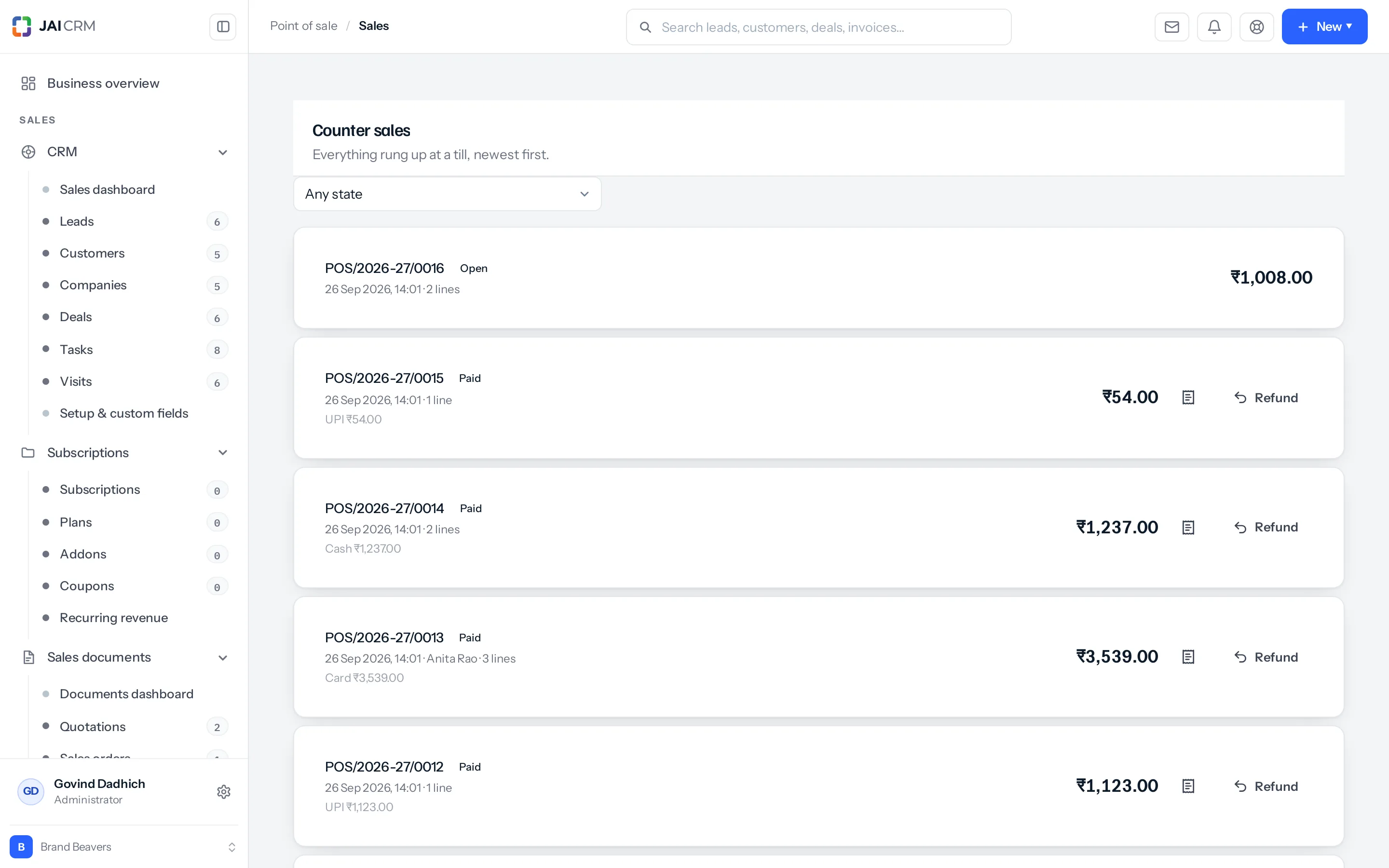 The Counter sales screen, headed "Counter sales — Everything rung up at a till, newest first", with an "Any state" dropdown. Five cards: POS/2026-27/0016 marked Open, 26 Sep 2026 14:01, 2 lines, ₹1,008.00, with no refund link; POS/2026-27/0015 Paid, 1 line, UPI ₹54.00, total ₹54.00, with a receipt icon and a Refund link; POS/2026-27/0014 Paid, 2 lines, Cash ₹1,237.00; POS/2026-27/0013 Paid, Anita Rao, 3 lines, Card ₹3,539.00; POS/2026-27/0012 Paid, 1 line, UPI ₹1,123.00.