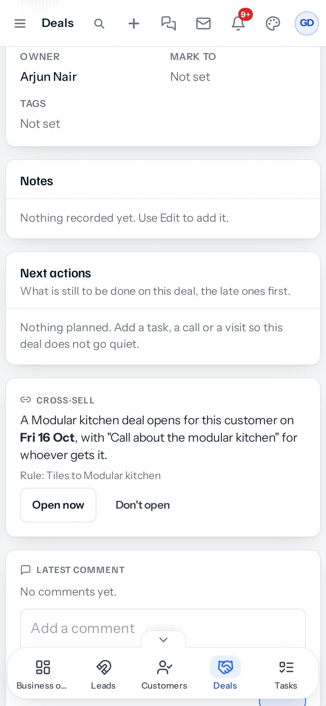 A deal on a phone showing the Cross-sell card: A Modular kitchen deal opens for this customer on Fri 16 Oct, with Call about the modular kitchen for whoever gets it, Rule: Tiles to Modular kitchen, with Open now and Don't open.
